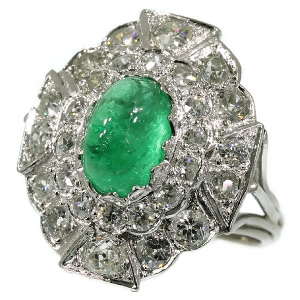 Impressive platinum estate ring with diamonds and cabochon emerald